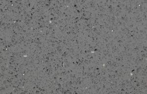 Grey Starlight Quartz close-up showing small reflective grains and speckled texture across the grey slab