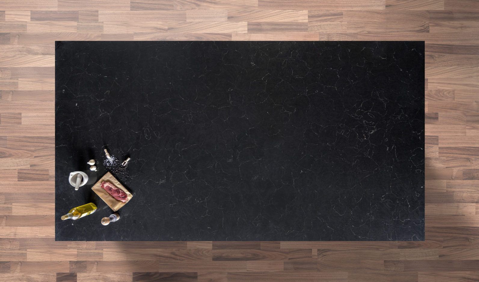 Emperor Black Quartz worktop shown from above with deep black surface and fine pale veining