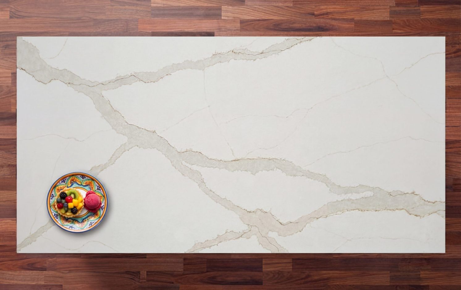Britannicca Calacatta Quartz worktop shown from above with warm grey veining across a bright white marble-effect surface