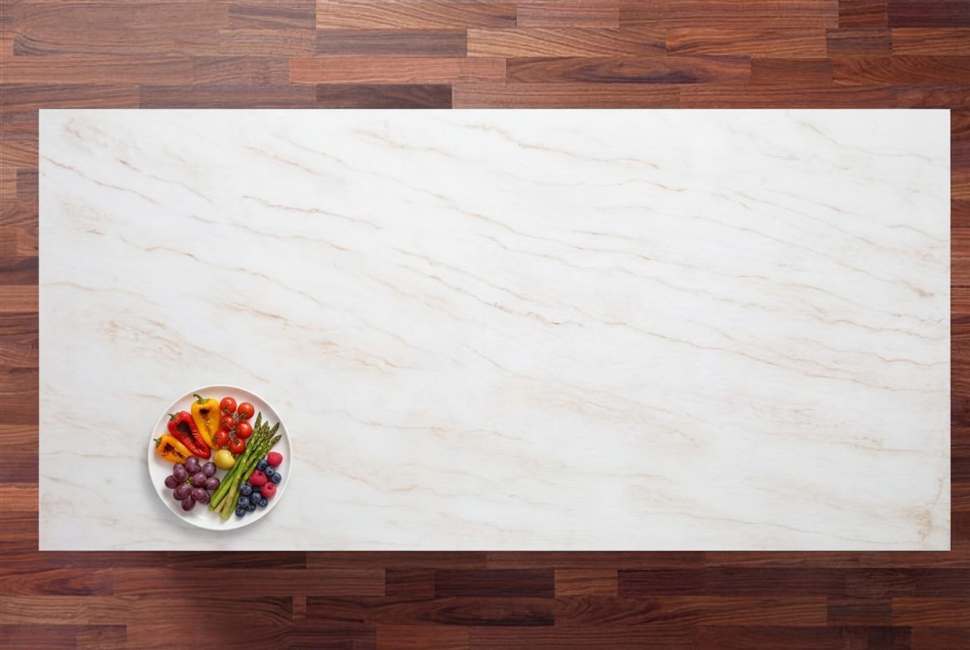 Taj Mahal Quartz worktop shown from above with warm white background and soft gold-beige veining