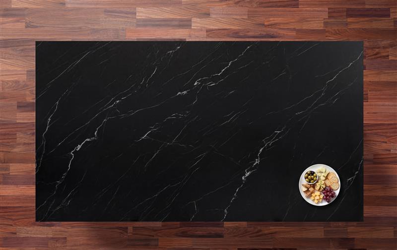 Marquina Venato Porcelain worktop in deep black with bold white veining, photographed from above with a small bowl at the corner