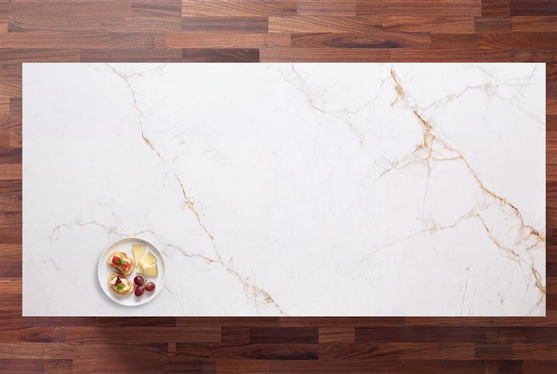 Abu Dhabi Bianco Porcelain island surface with white base and subtle gold veining