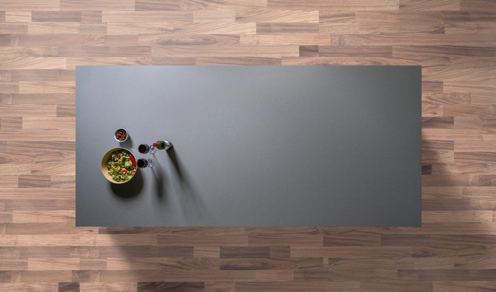 Gris Expo Quartz worktop shown from above with uniform mid-grey surface and subtle fine grain texture