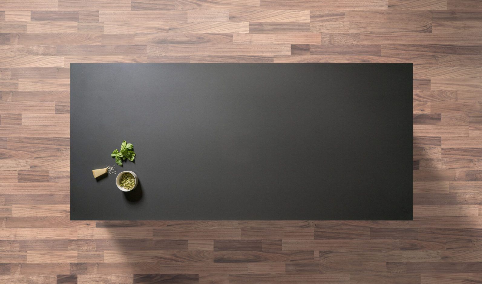 Marengo Quartz worktop shown from above with deep charcoal grey surface and a smooth, uniform finish across the slab