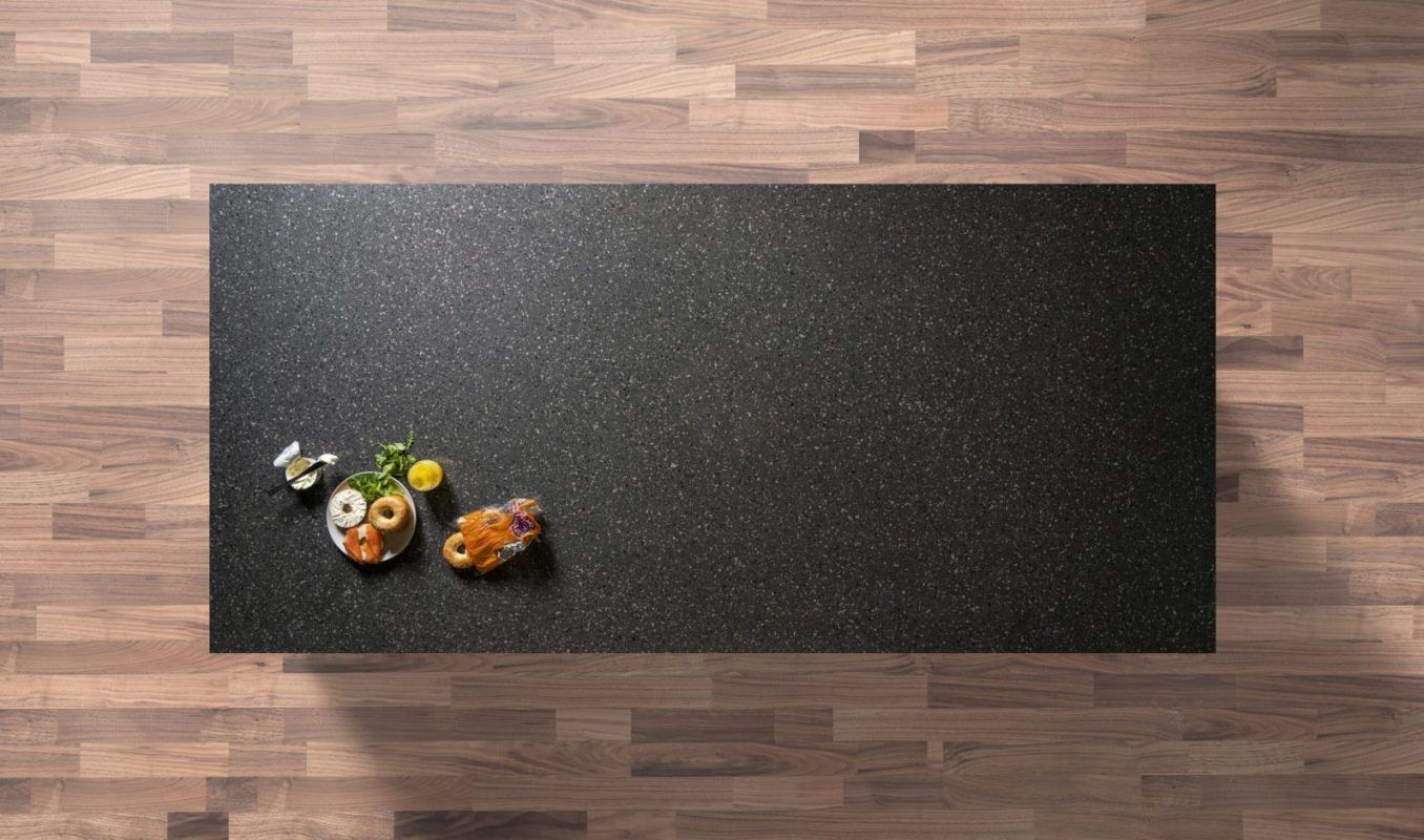 Platinum Quartz worktop shown from above with dark grey speckled surface and uniform aggregate pattern across the slab