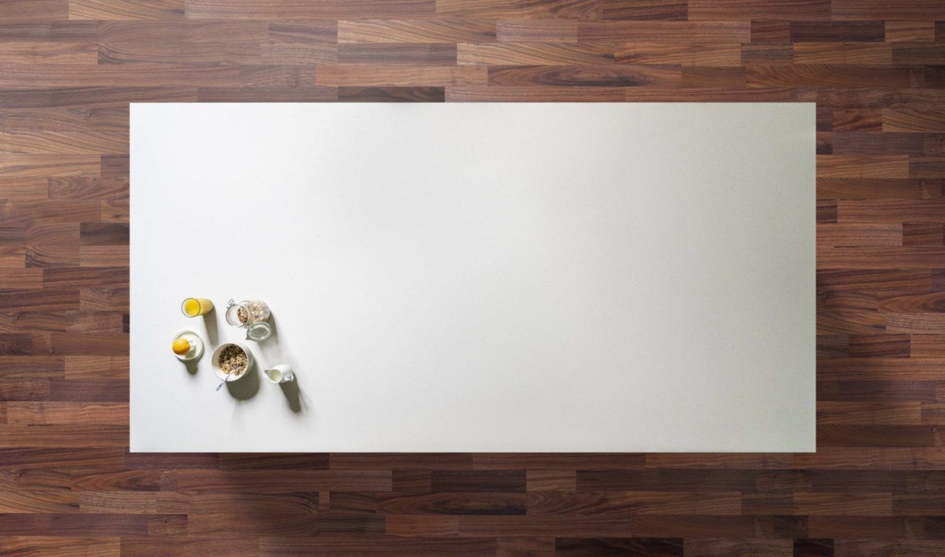 Stardust Quartz worktop shown from above with bright white surface and fine multicolour speckling across the slab
