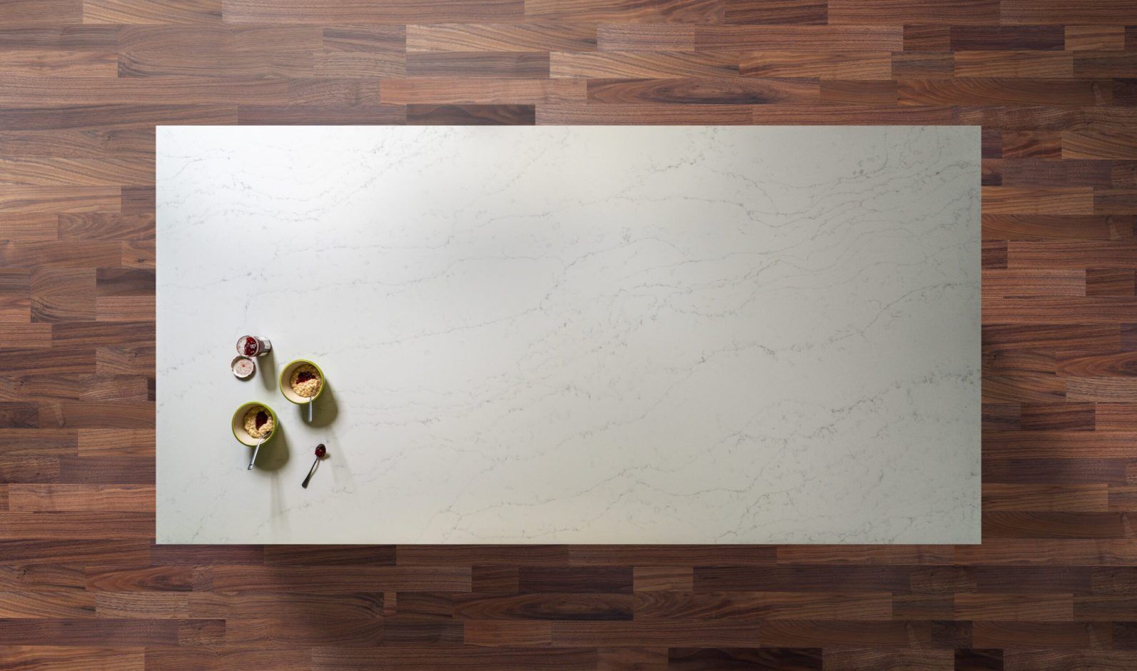 Statuario Bianco Porcelain slab displayed on a wooden surface showing soft grey veining