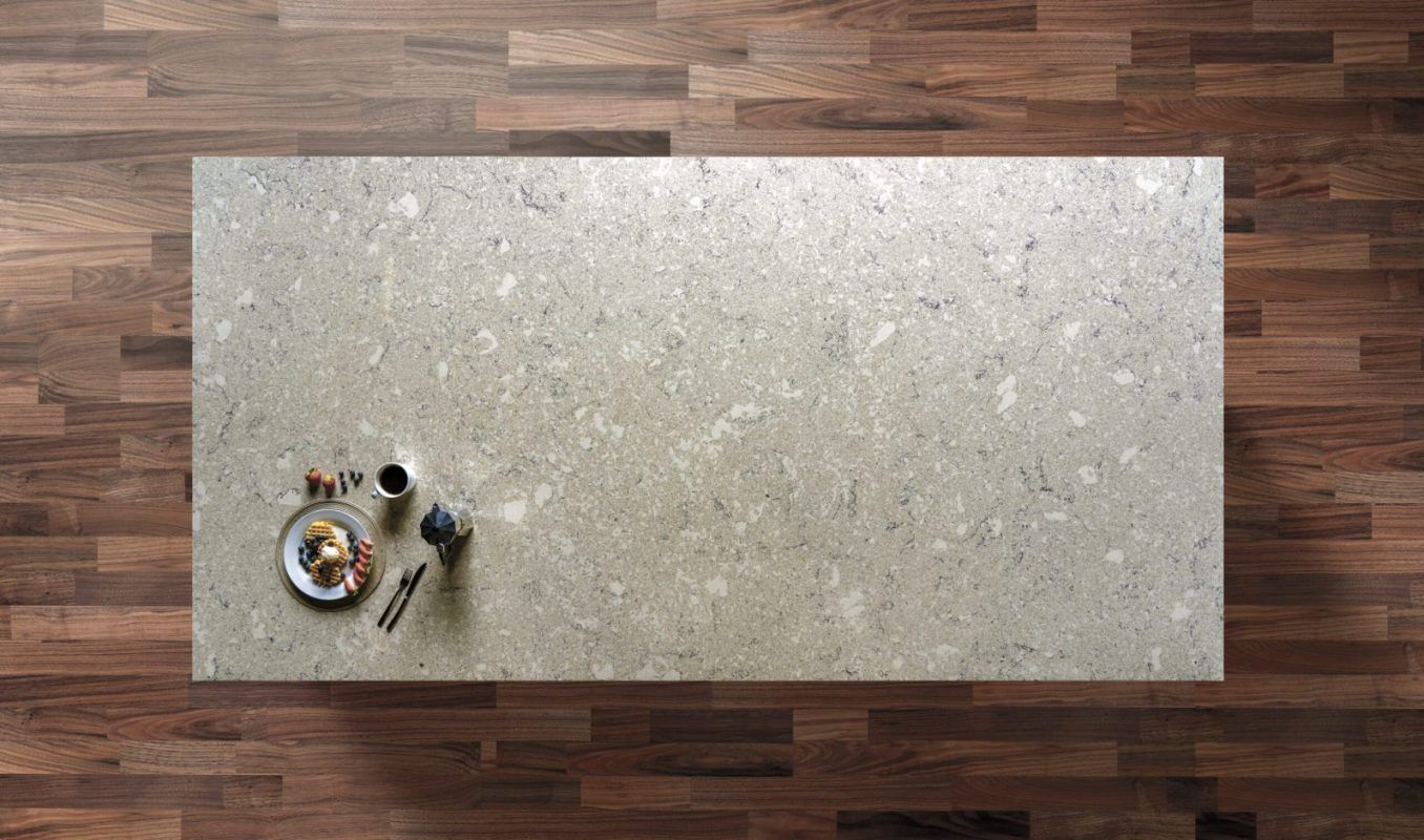 Venetian Drift Quartz worktop shown from above with warm grey stone-effect pattern and subtle flecks across the surface