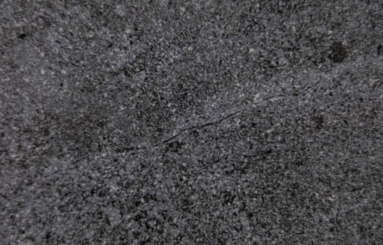 Pierre Bleue Porcelain slab detail with dark grey textured finish