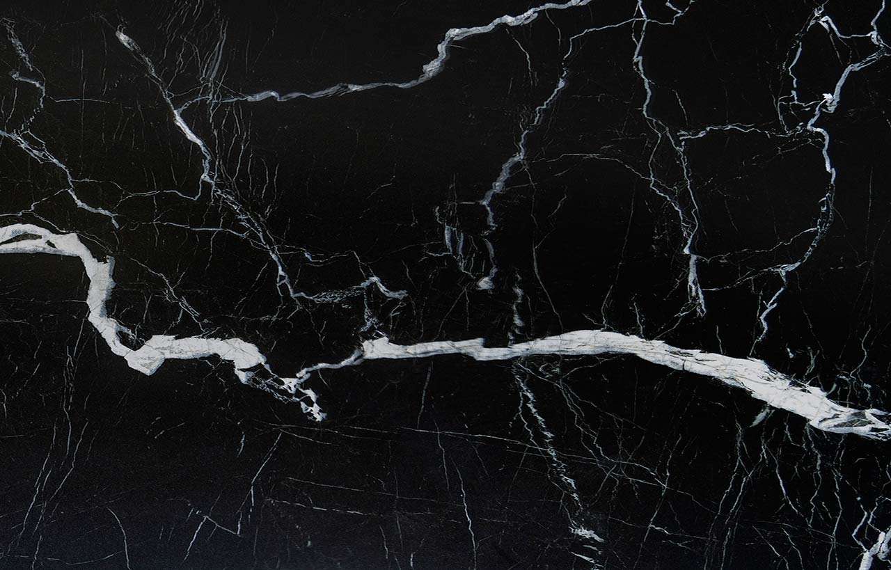 Black Mirage Porcelain slab with dramatic white veining on black surface