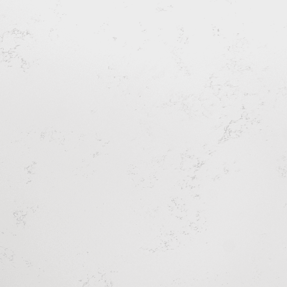 Bluetta Carrara Quartz slab close-up showing soft grey veining across a smooth white finish