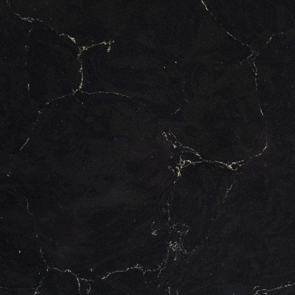 Emperor Black Quartz slab close-up showing fine pale veining and natural stone-effect movement on a deep black base