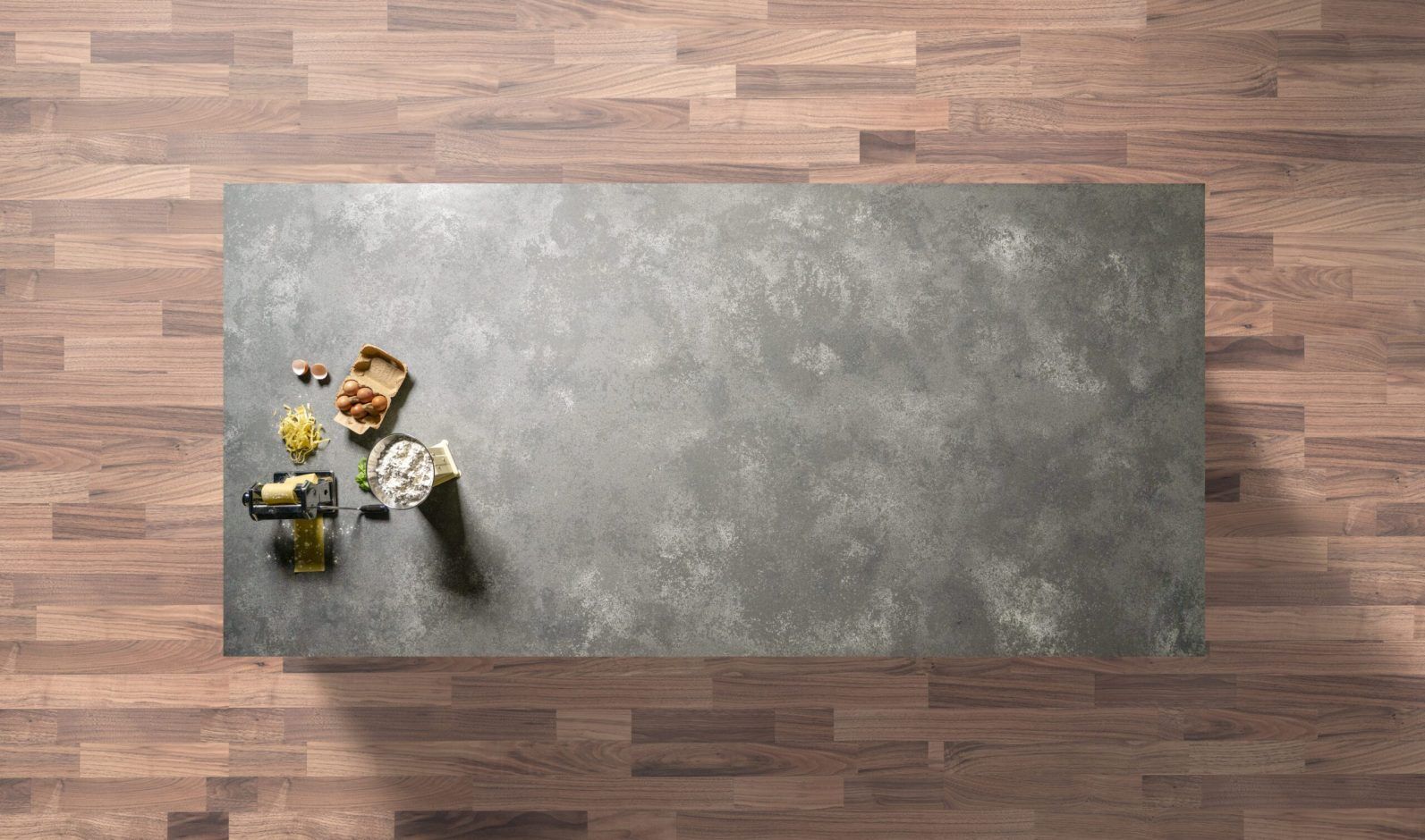 Grey Concrete Quartz full slab shown from above with mid-grey concrete-effect surface and cloudy tonal movement across the worktop