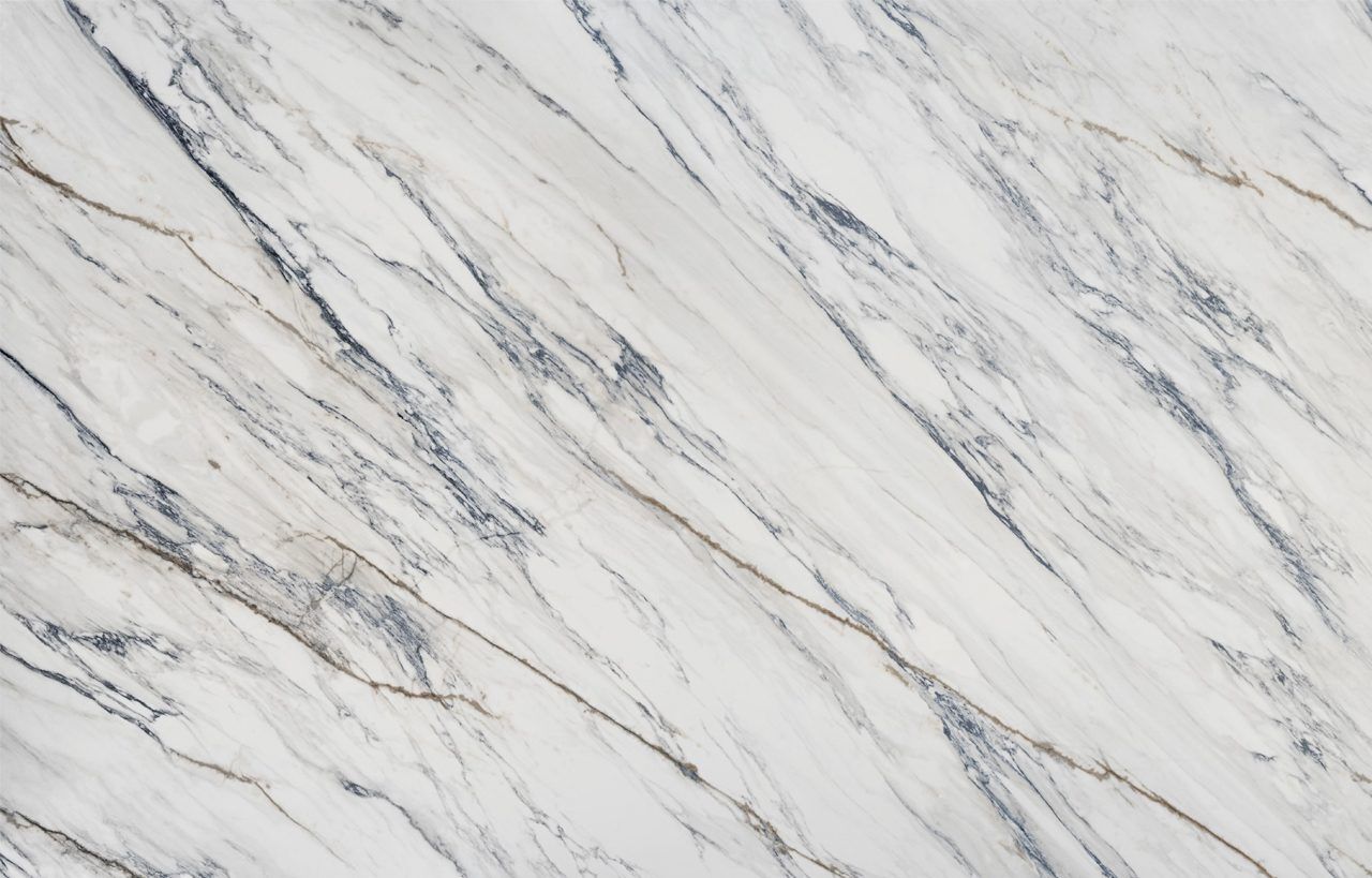 Trance Porcelain surface close up in white with layered grey veining and subtle beige tones