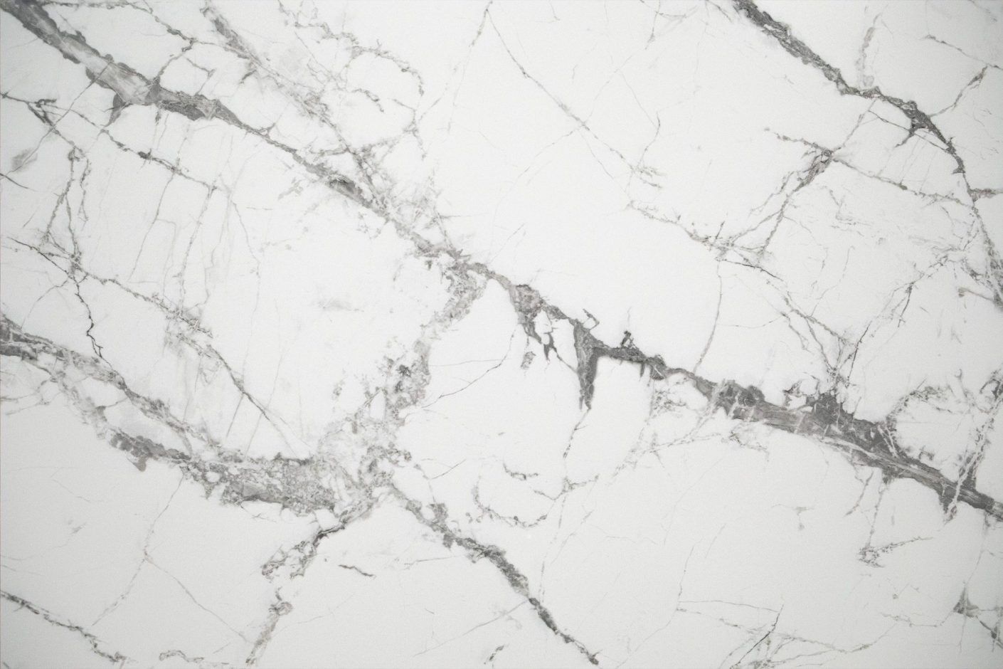 Invisible White Porcelain surface detail with soft grey veining pattern