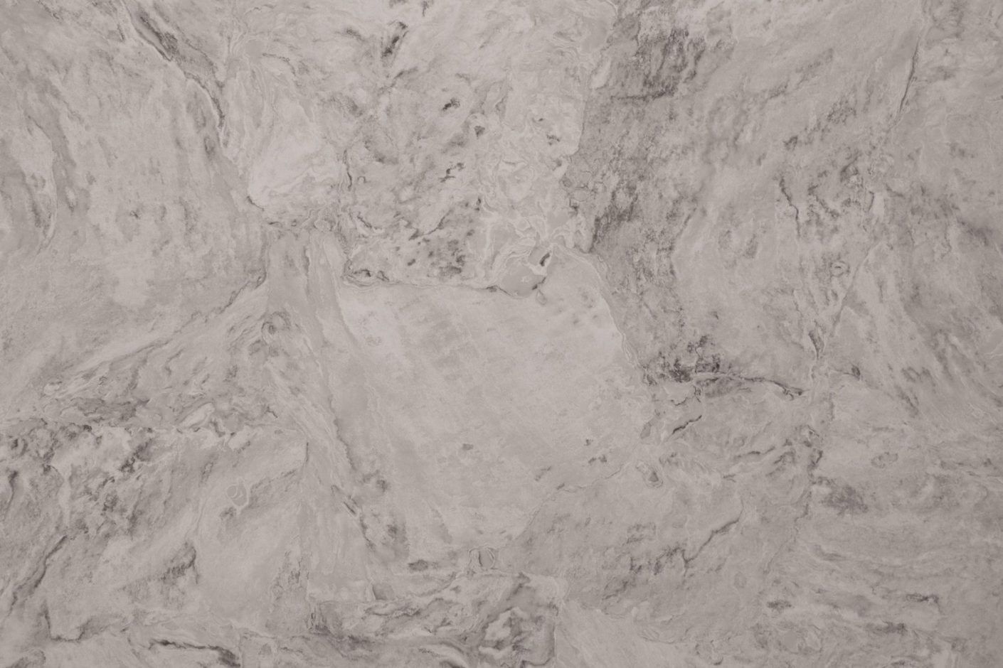 Ivory Drift Quartz slab close-up showing flowing grey veining and cloudy stone-style patterning