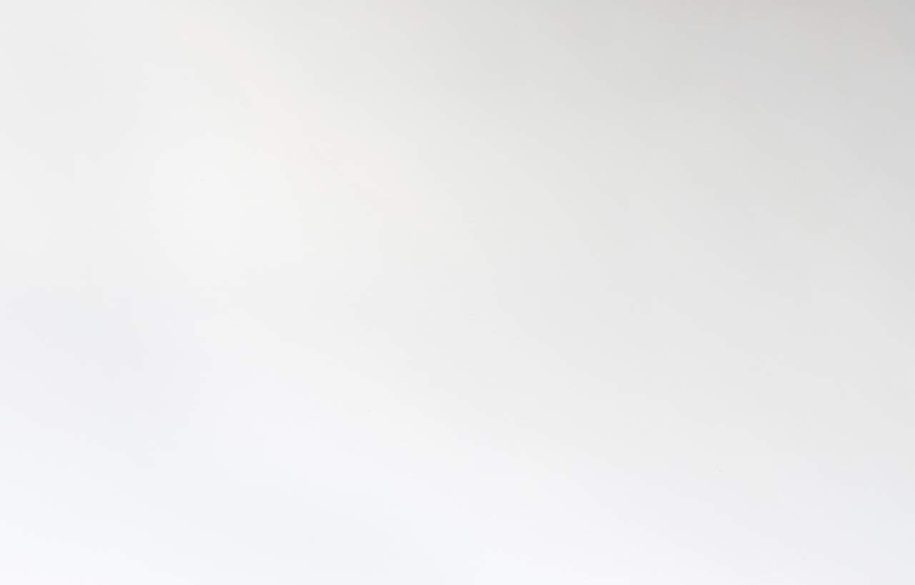 White Thasos porcelain surface sample with smooth light stone effect