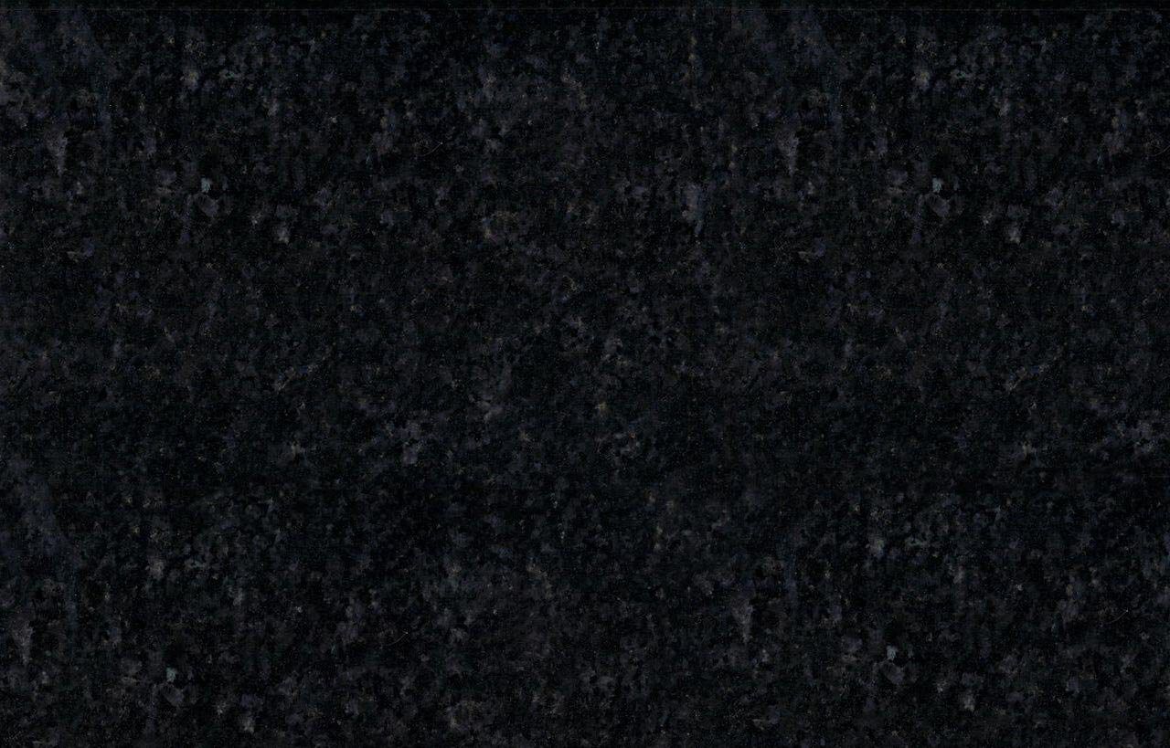 Close up slab photo of Black Pearl Granite showing a dark base with shimmering flecks and natural crystal patterning.