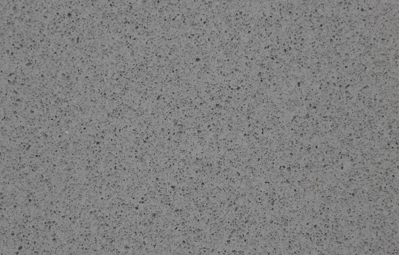 Slate Grey Quartz slab close-up showing fine speckle texture across a dark grey surface