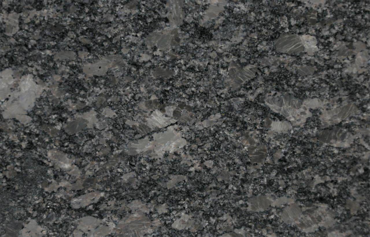 Close up slab photo of Steel Grey Granite showing a mottled grey pattern with natural crystal movement and fine grain texture.