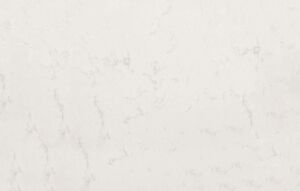 Close up of Carrara Quartz surface showing soft white background and light grey veining
